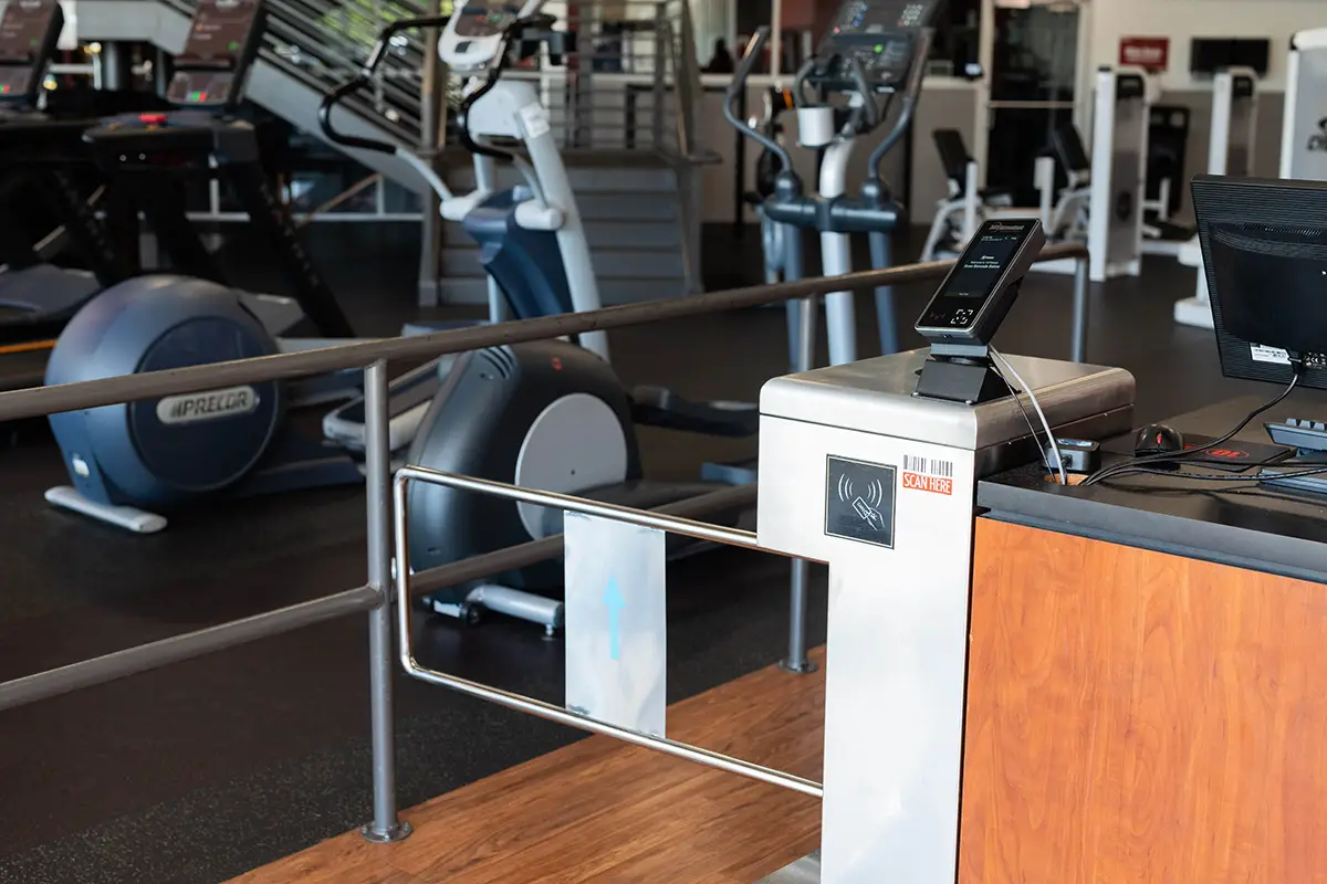 A gated 365 Attendant kiosk inside a gym